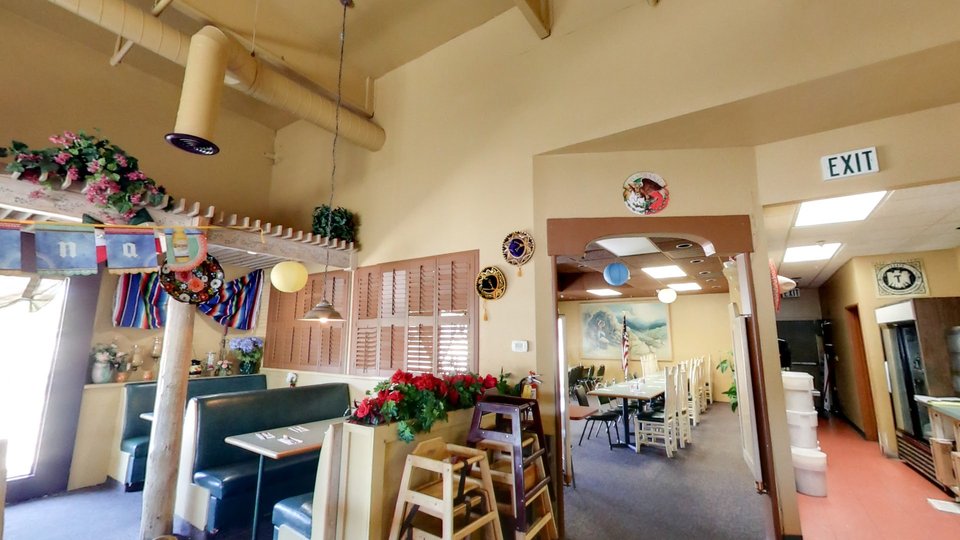 Table service setup inside a cozy Mexican restaurant